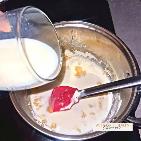 pouring of milk in hot pot